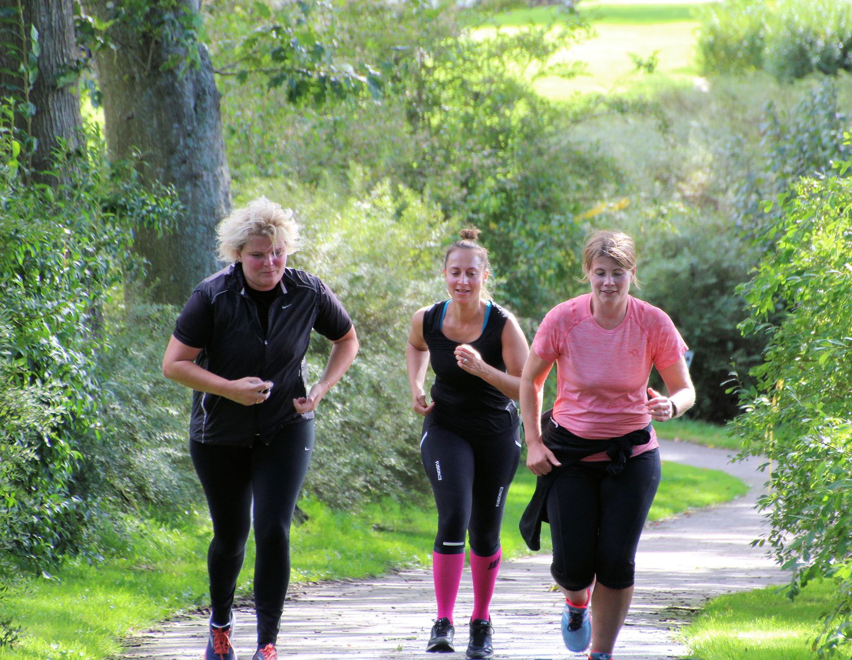 Foto af tre medarbejdere til rådhusdyst